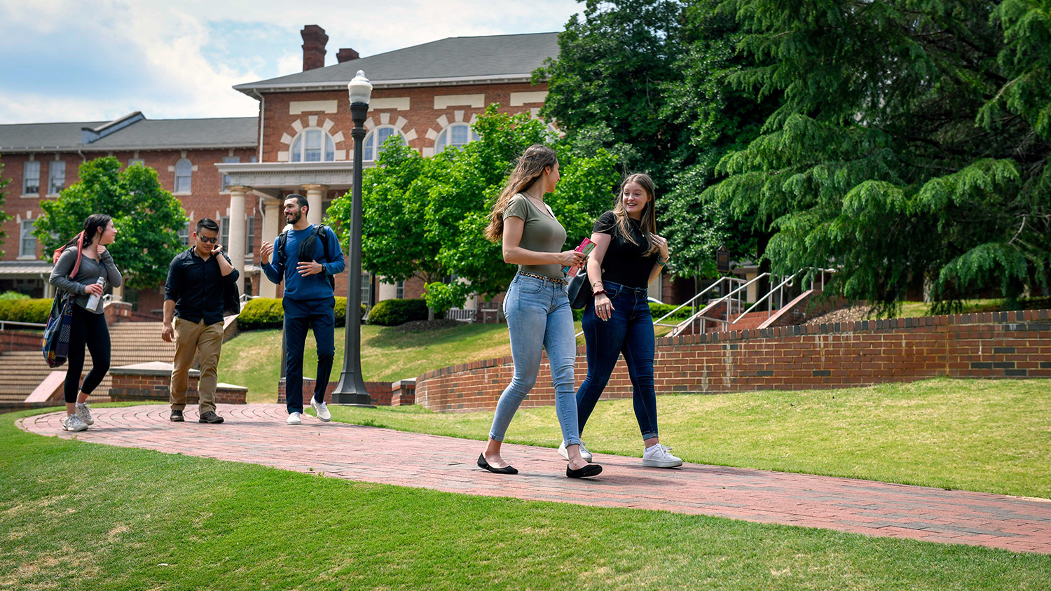 Students walk across NC State's Court of North Carolina
